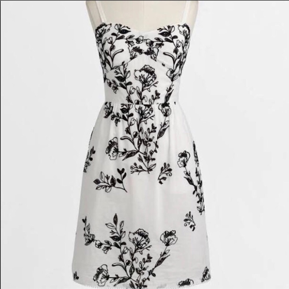 White summer dress with black embroidery detail